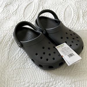 Brand New w/ Tags charcoal gray Crocs. Men’s 6 / Women’s 8.